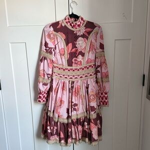It’s giving Zimmerman without the price tag! Pink and burgundy floral dress sm.